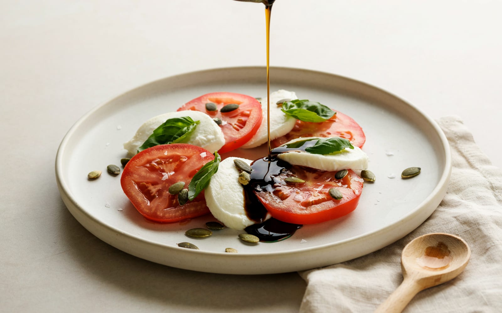Tomato and Mozzarella with Pumpkin Seed Oil - gallery 1