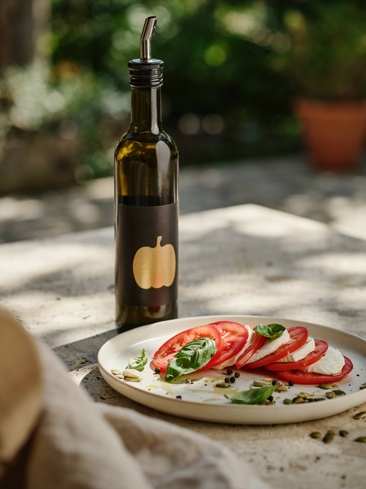 Tomato and Mozzarella with Pumpkin Seed Oil